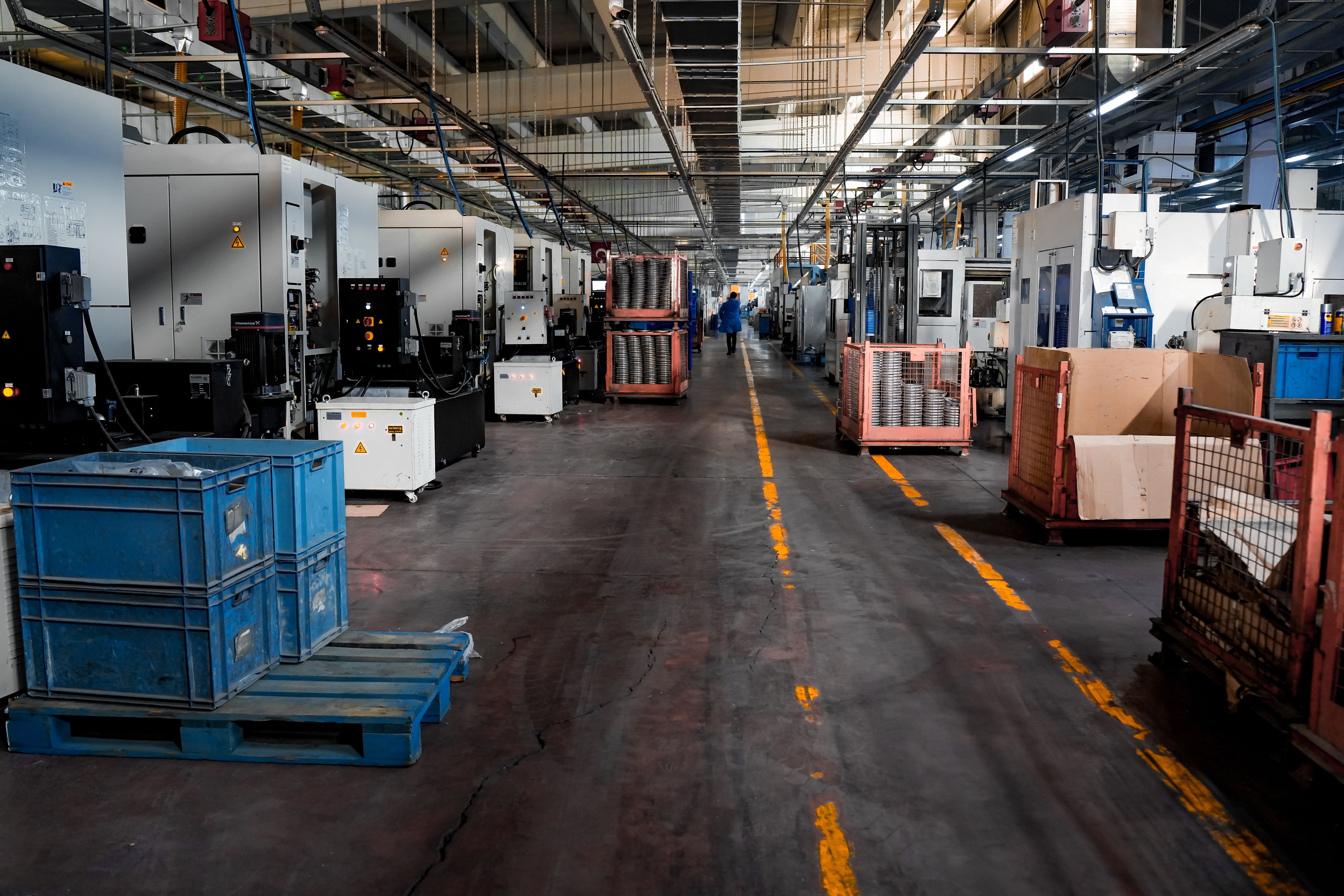Production floor with machining equipment and metal fabrication in progress
